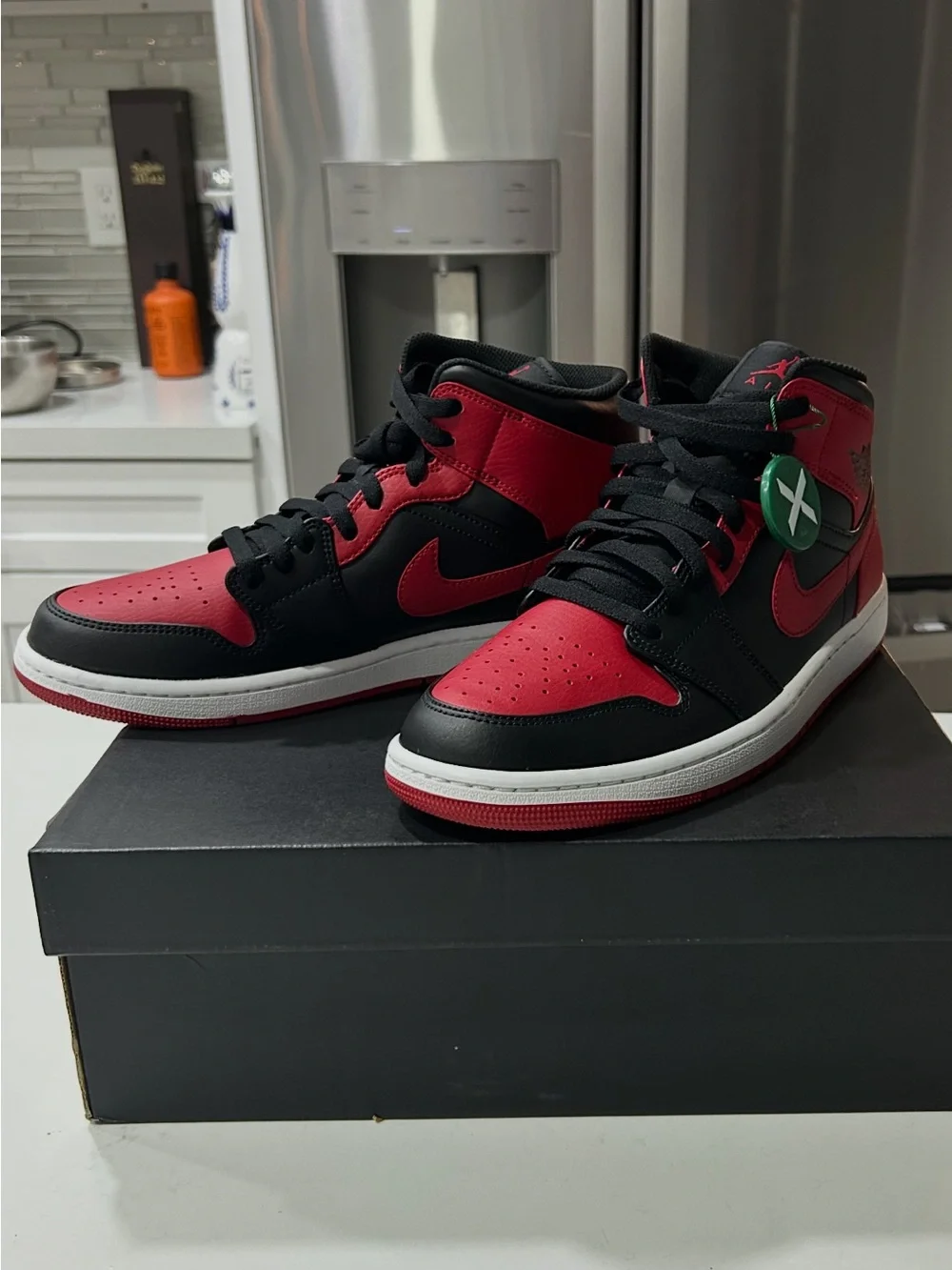 Nike Air Jordan 1 Mid Black and Red Sneakers